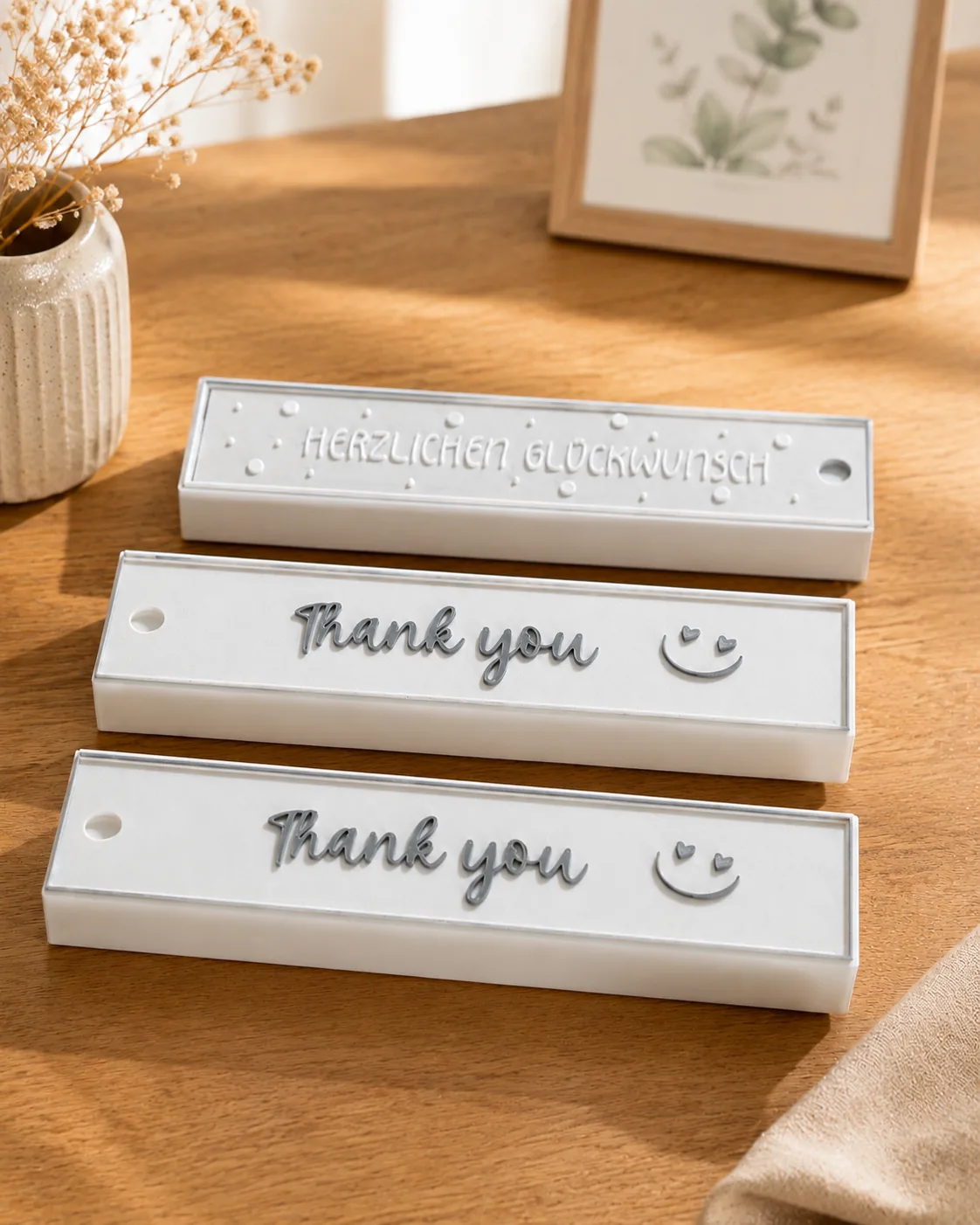 3D-gedruckte Geschenkboxen Thank you und Herzlichen Glückwunsch gestapelt